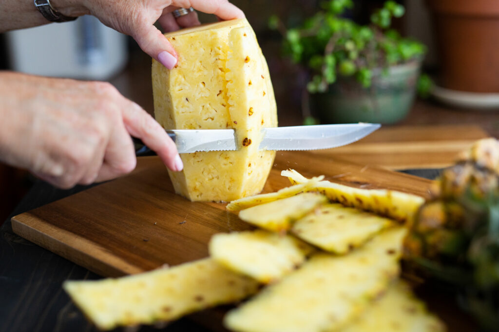 Cutting a pineapple