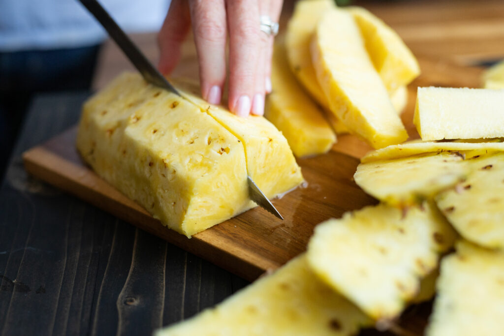 Cutting a pineapple