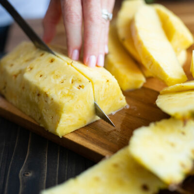 Cutting a pineapple